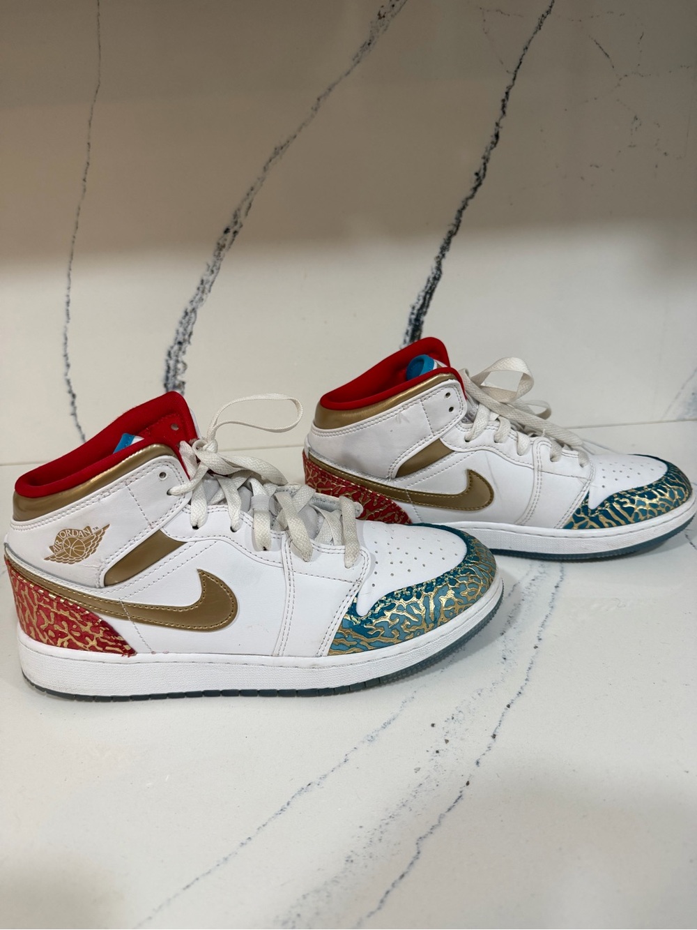 Nike youth UNC to Chicago sneakers
